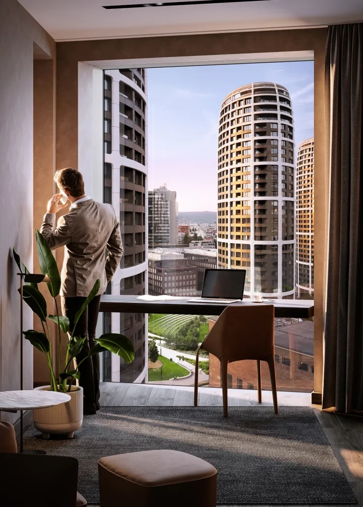 Проект Sky Park Tower: Рабочий стол у панорамного окна с видом на округлые башни