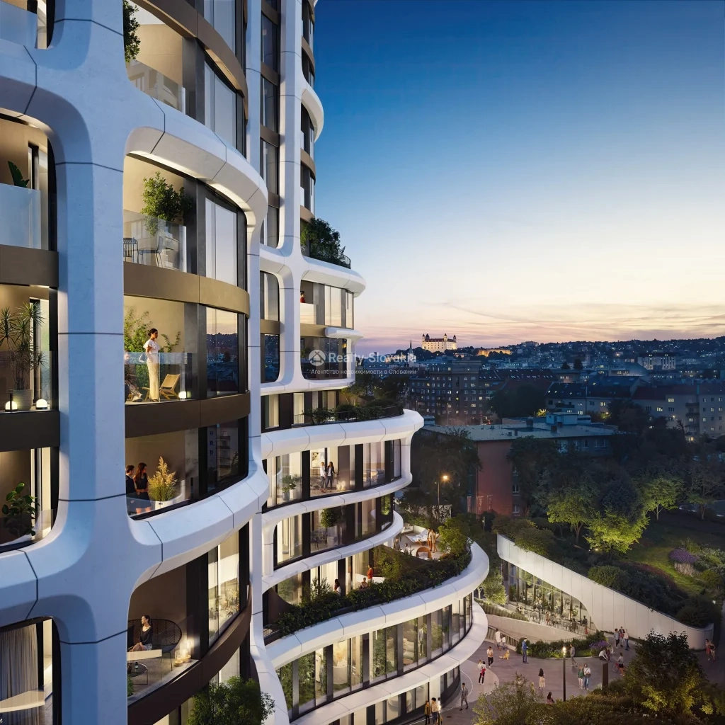 Проект Sky Park Tower: Фрагмент фасада башни с округлыми белыми рамами на фоне синего неба