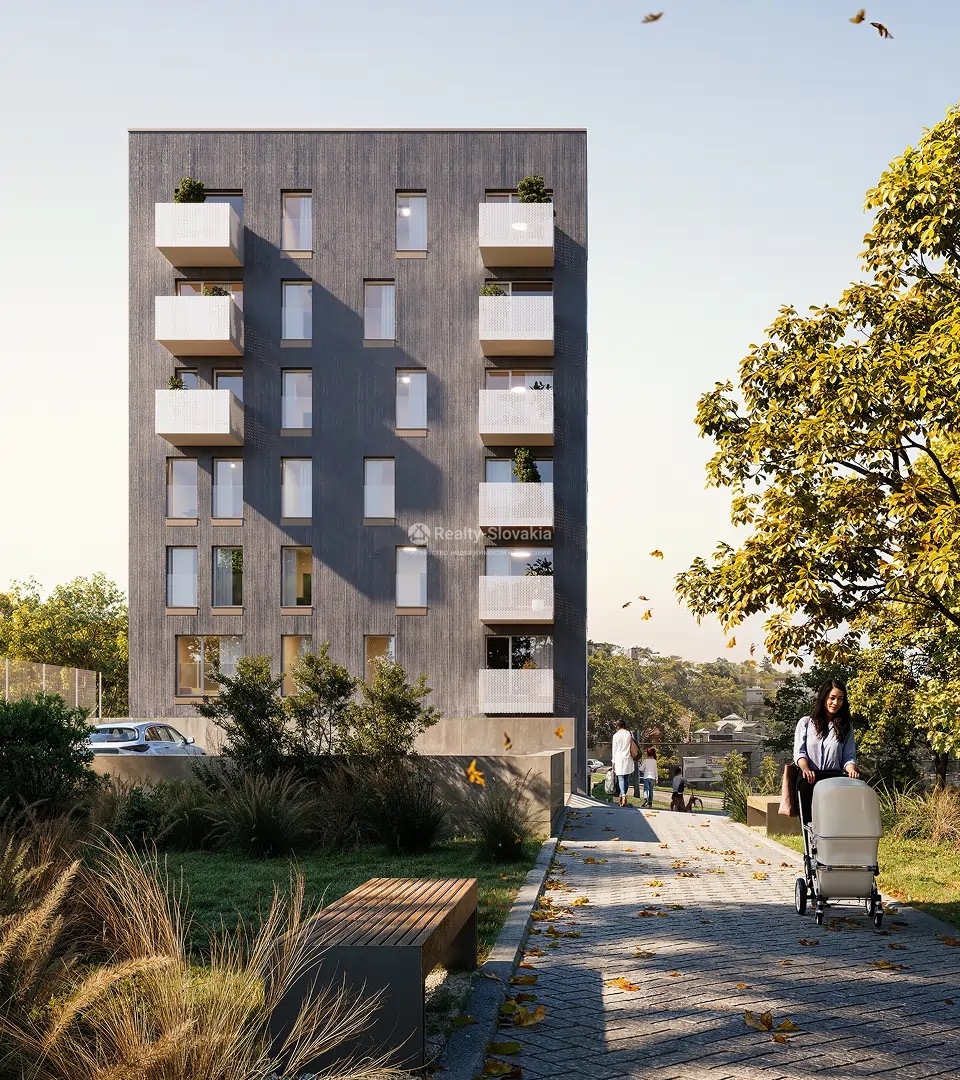 Проект Kramáre Living: Контрастный тёмно-белый корпус у улицы в сумерках