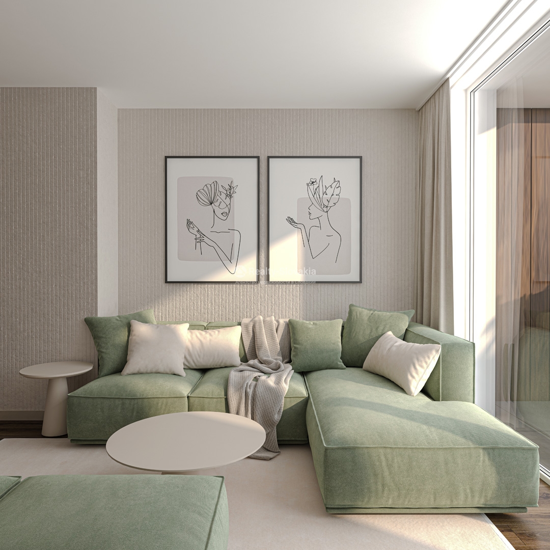 Проект Olivia Residence: Гостиная с зелёным угловым диваном и двумя картинами
